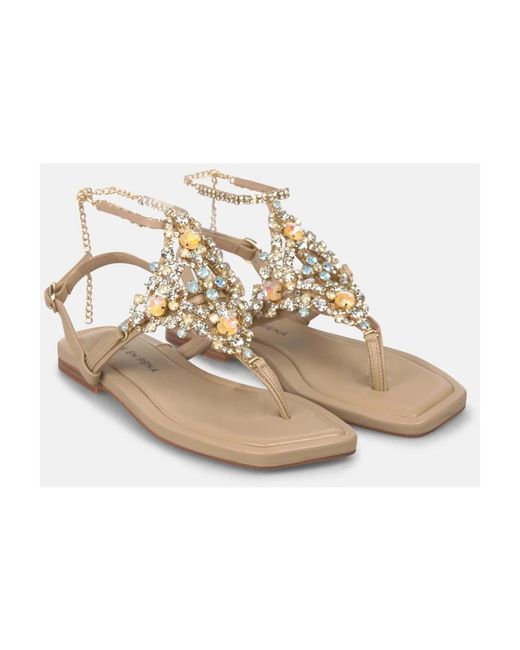 Alma En Pena. Metallic Flat Sandals