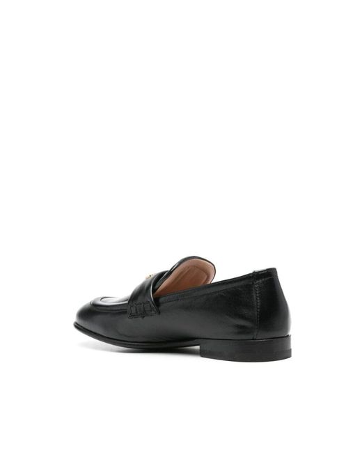 Moschino Black Schwarze flache schuhe mit goldverzierung