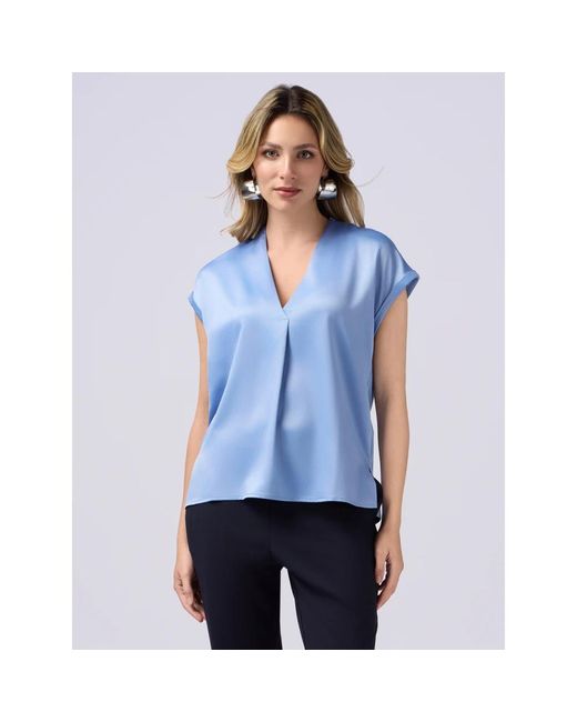 Blouses di Oltre in Blue