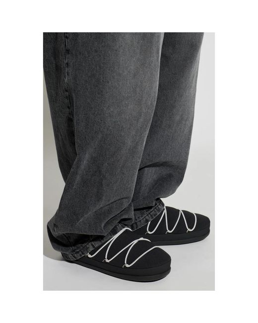 Slippers Moon Boot pour homme en coloris Black