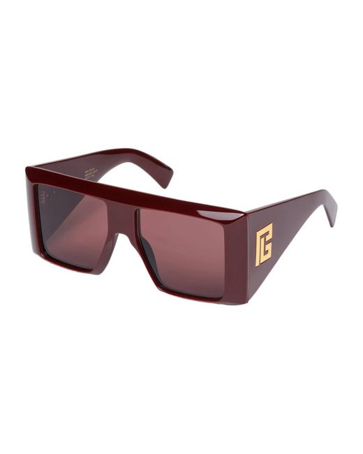 Sunglasses di Balmain in Purple