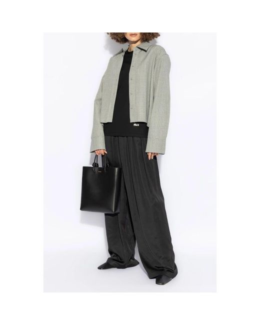 Long Sleeve Tops di Jil Sander in Black