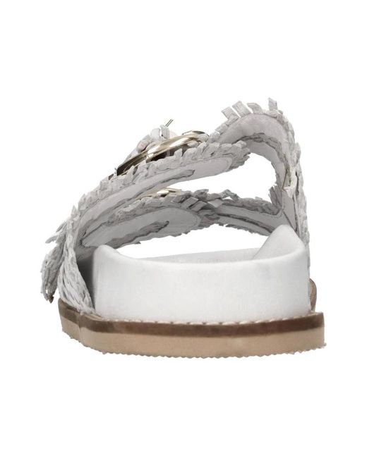 Emanuélle Vee White Sliders