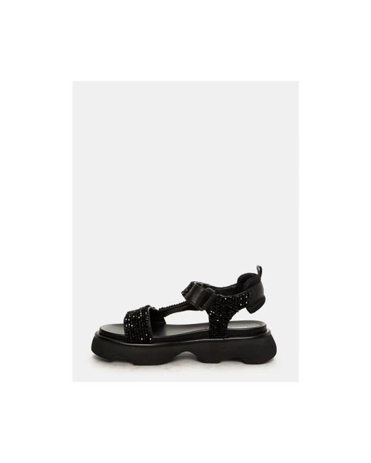 Flat Sandals di Jeannot in Black
