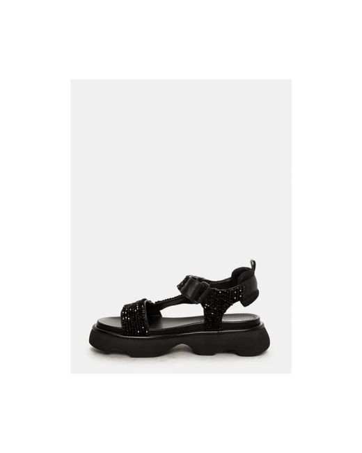 Flat Sandals Jeannot en coloris Black