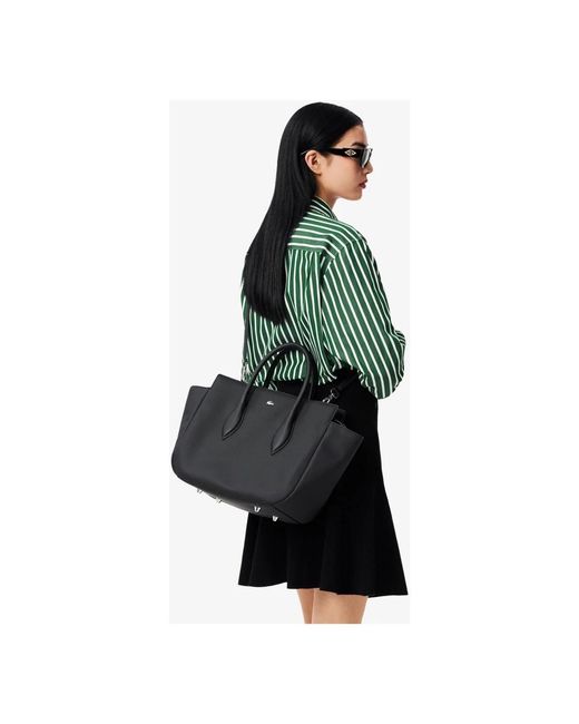 Handbags di Lacoste in Black