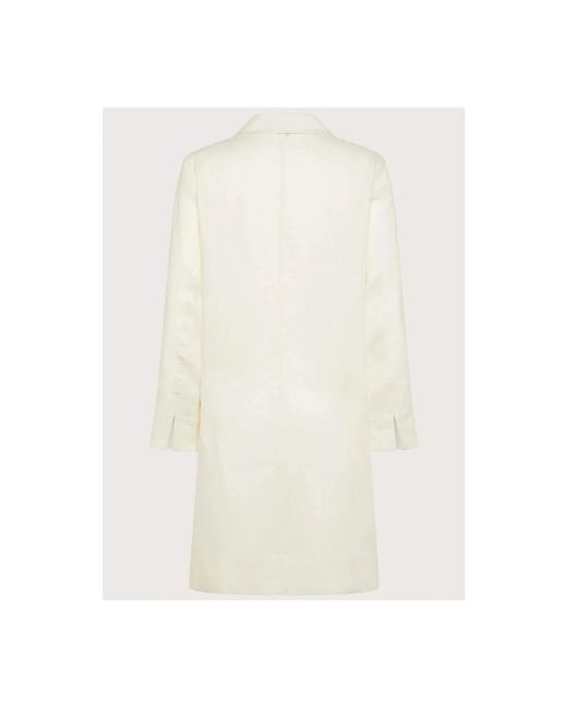 Seventy White Single-Breasted Coats