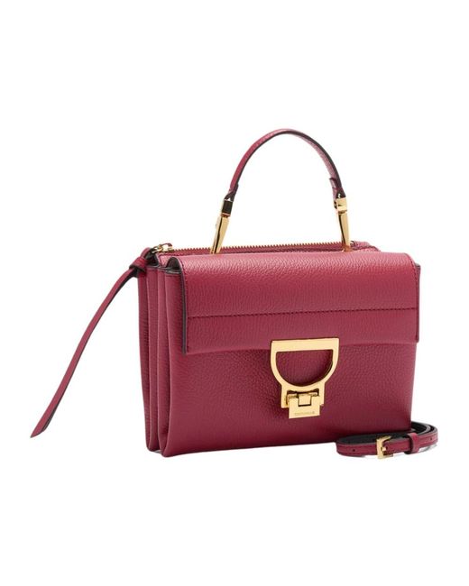 Handbags di Coccinelle in Red