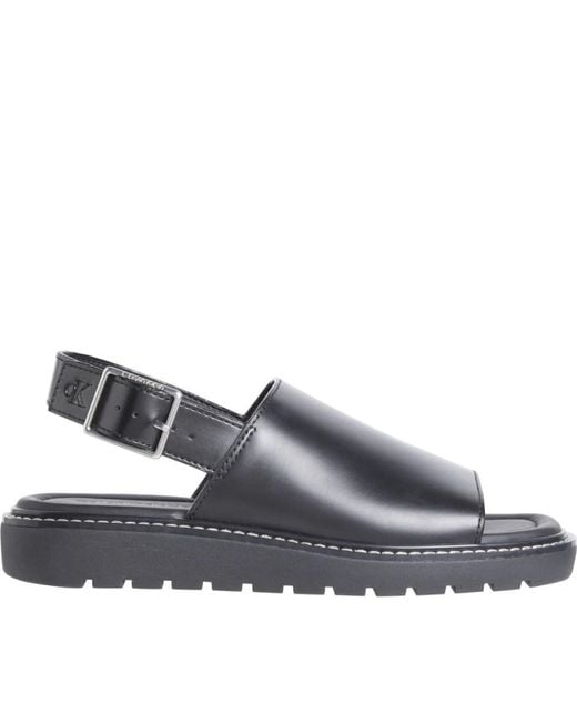 Calvin Klein Gray Schwarze Flache Sandalen Für Frauen