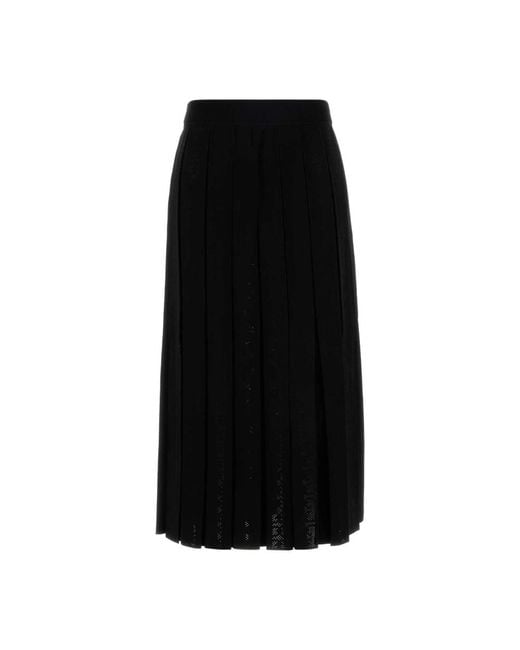 Midi Skirts Tory Burch de color Black