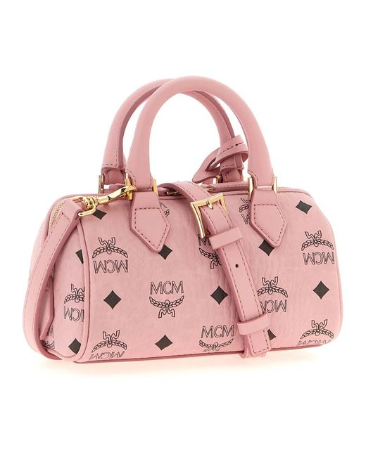 Handbags MCM de color Pink