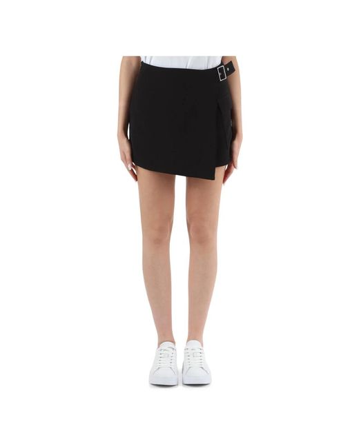 Minifalda de tela elástica con cremallera Calvin Klein de color Black