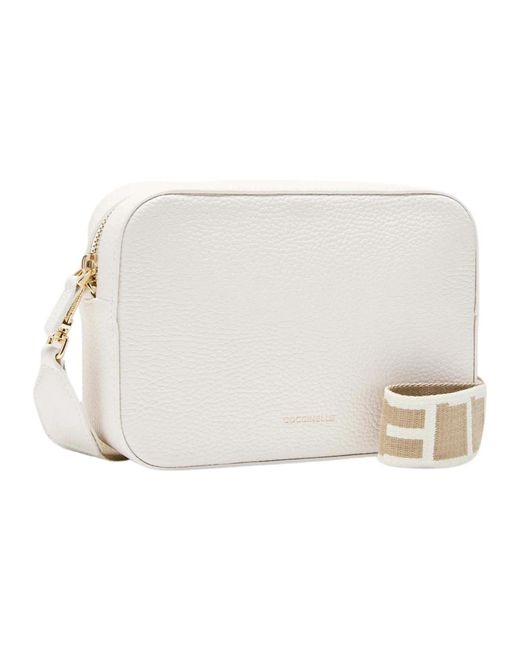 Cross Body Bags di Coccinelle in White