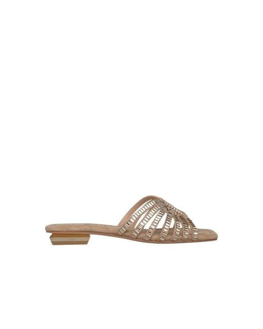 Alma En Pena. Brown Sliders