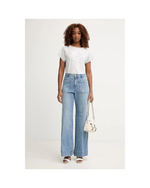 Flared Jeans Michael Kors de color Blue