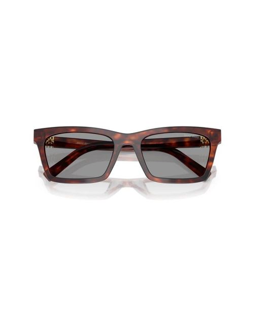 Miu Miu Metallic Stilvolle sonnenbrille in schwarz,stilvolle sonnenbrille in goldfarbe