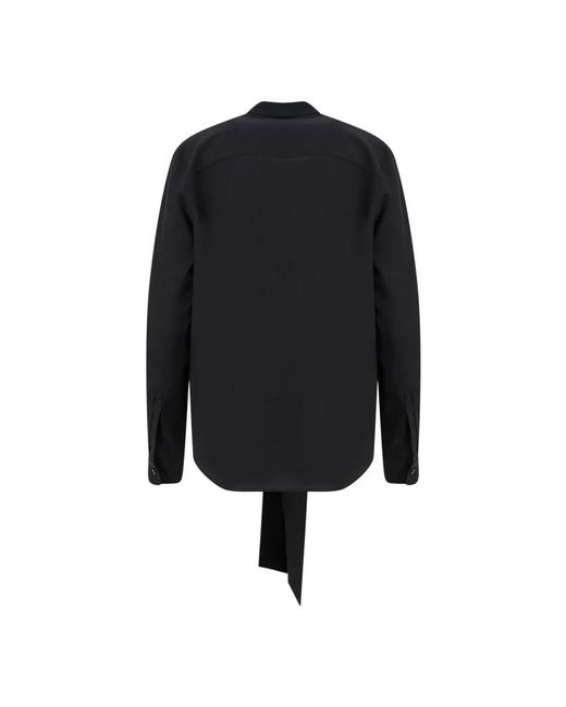 Blouses Burberry en coloris Black