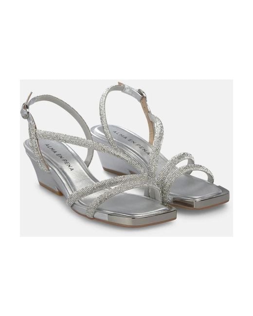 Alma En Pena. Metallic High Heel Sandals