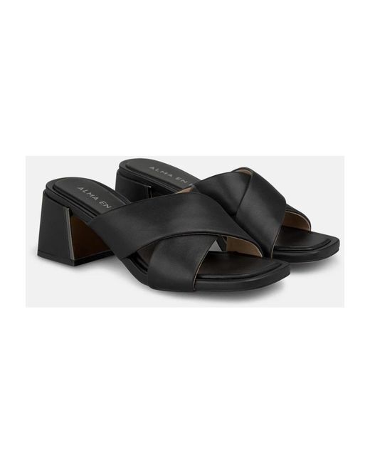 Alma En Pena. Black Heeled Mules