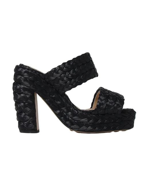 BOTTEGA VENETA 26S FLAT MULES IN BLACK LAMBSKIN main image 0