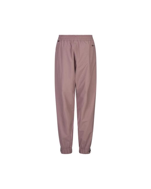 Pantaloni rosa da esterno con zip impermeabili di Moncler in Purple