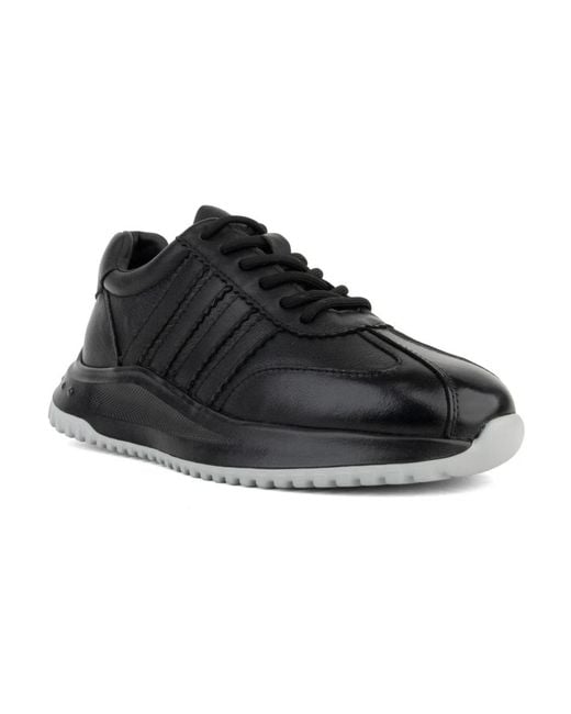 Linda Baumann Black Sneakers