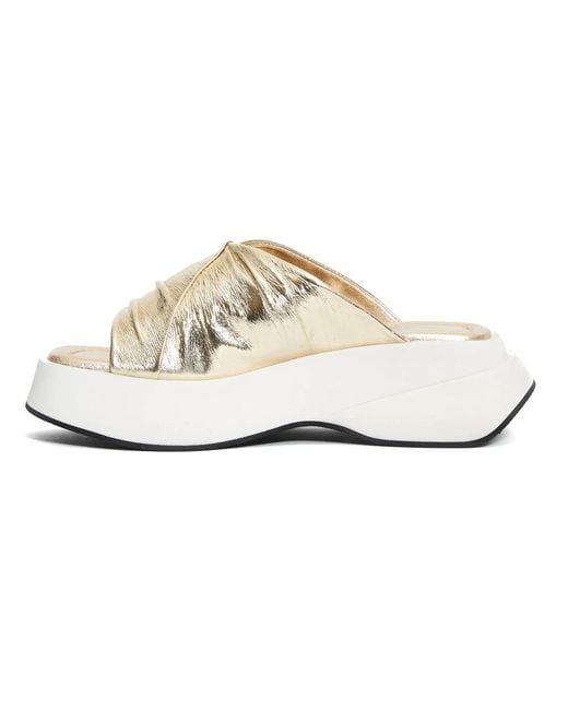 Elena Iachi White Sliders