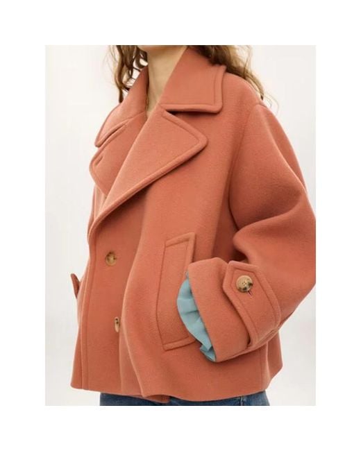 Chloé Orange Trench Coats