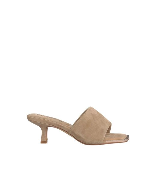 Alma En Pena. Natural Heeled Mules