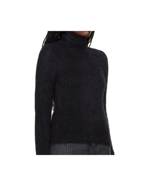 AMI Black Turtlenecks