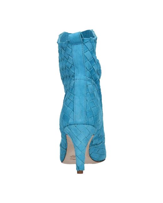 The Seller Blue Heeled Boots