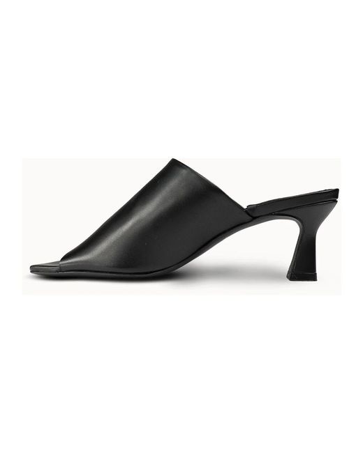 Heeled Mules di JoDis in Black