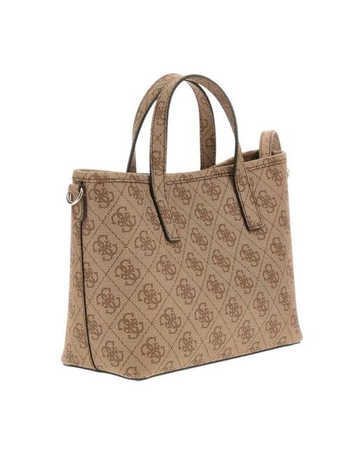 Handbags di Guess in Brown