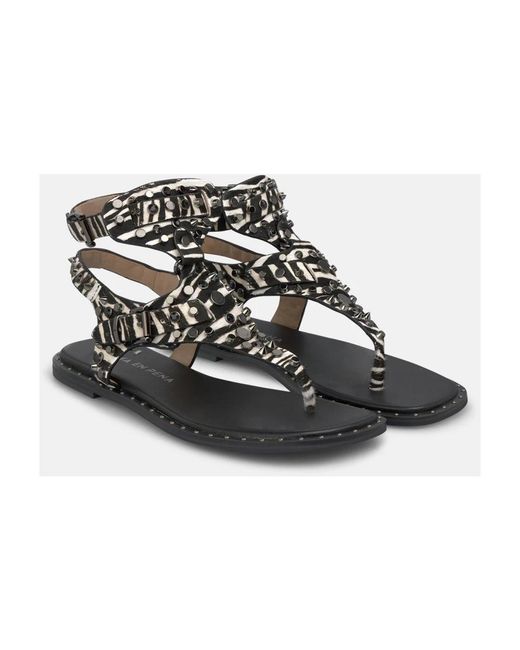 Alma En Pena. Metallic Flat Sandals