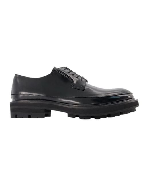 Zapatos planos oversize de cuero Alexander McQueen de color Black