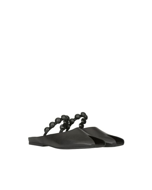 Mules Ash en coloris Black