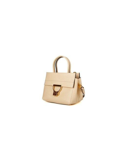 Coccinelle Metallic Handbags