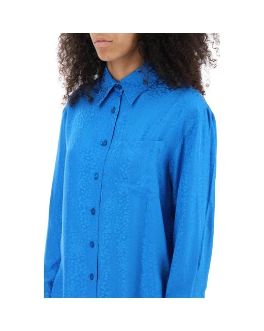 Art Dealer Blue Shirts