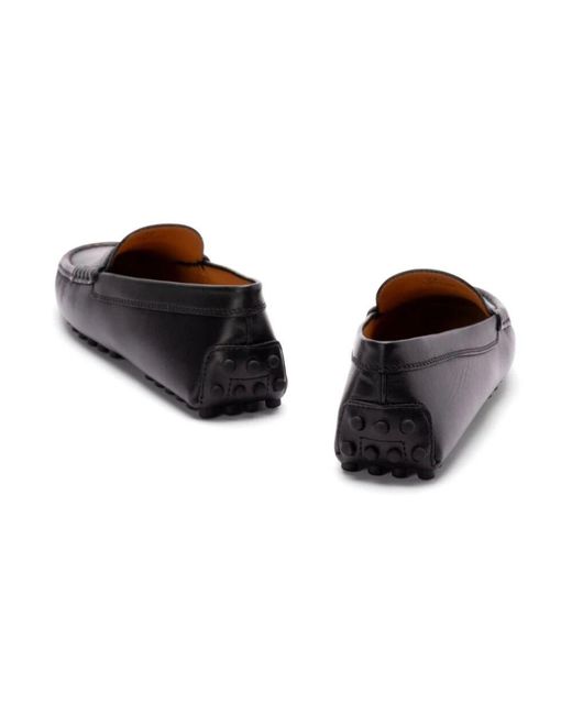 Tod's Black Schwarze penny slot flache schuhe