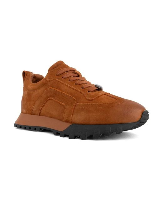 Linda Baumann Brown Sneakers