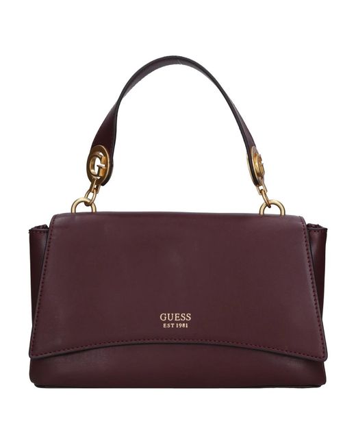 Handbags Guess de color Purple