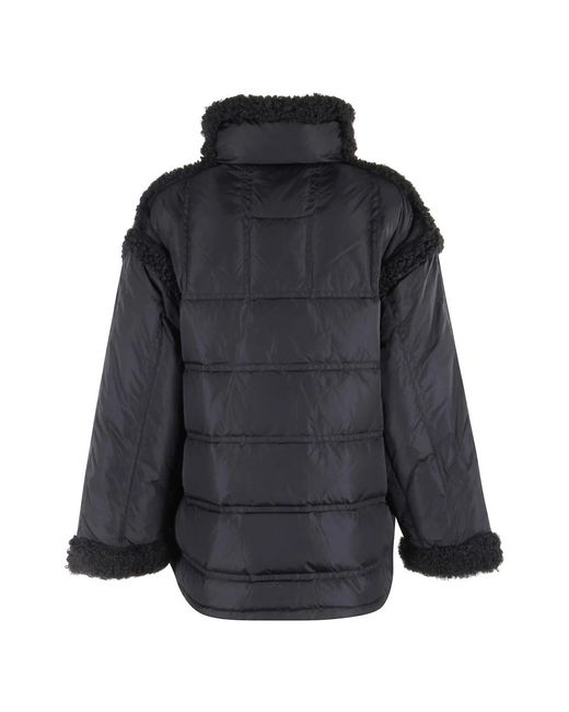 Winter Jackets Stand Studio de color Black