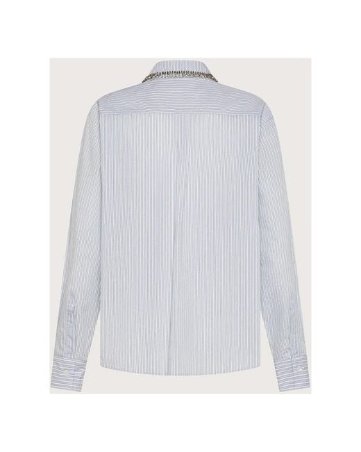 Seventy White Shirts