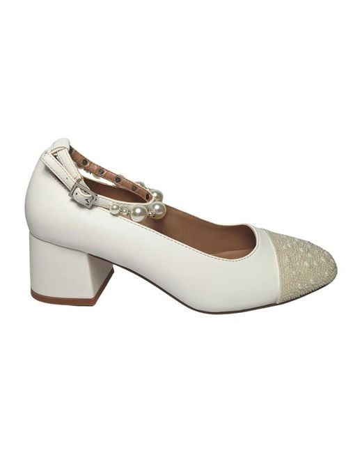 Steve Madden White Pumps