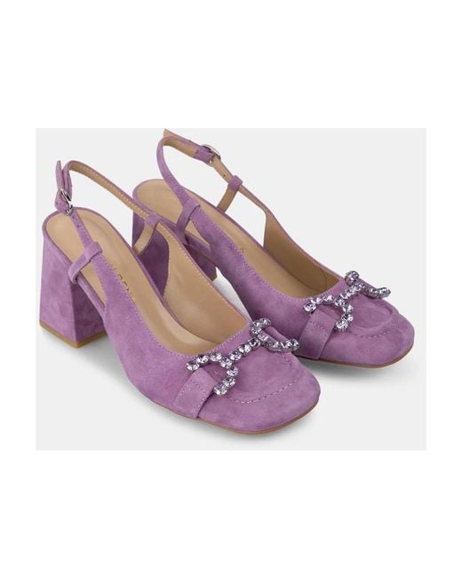 Alma En Pena. Purple Pumps