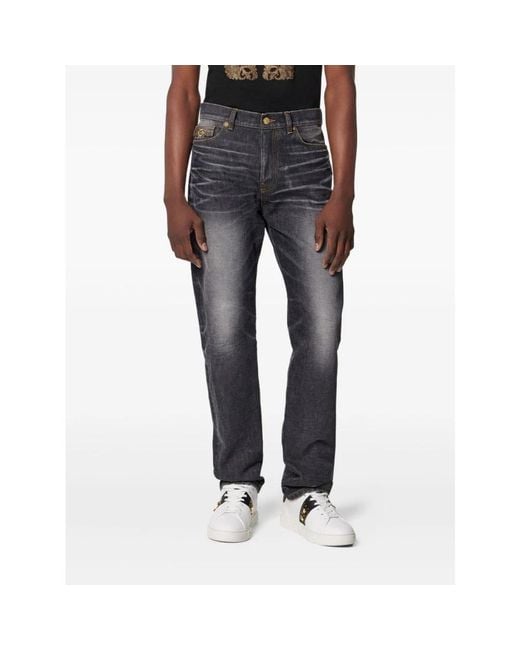 Slim-Fit Jeans Versace pour homme en coloris Gray