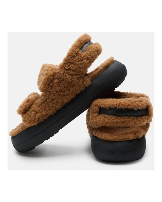 Flat Sandals di Moon Boot in Brown
