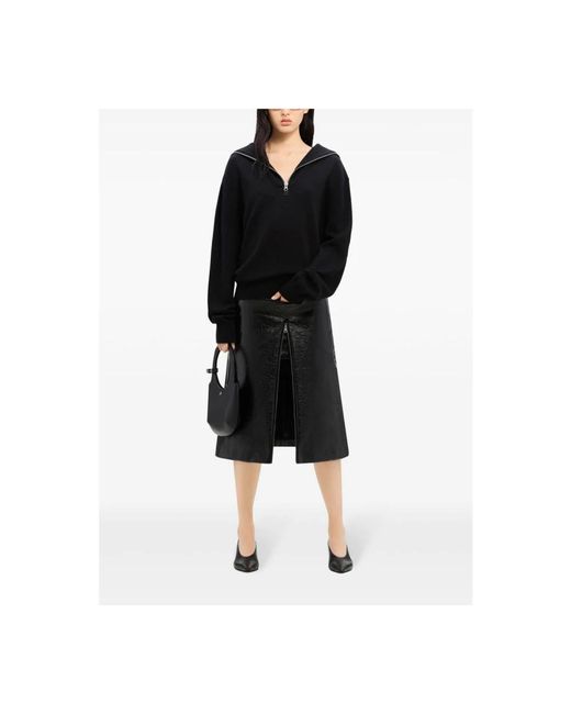 Courreges Black Turtlenecks