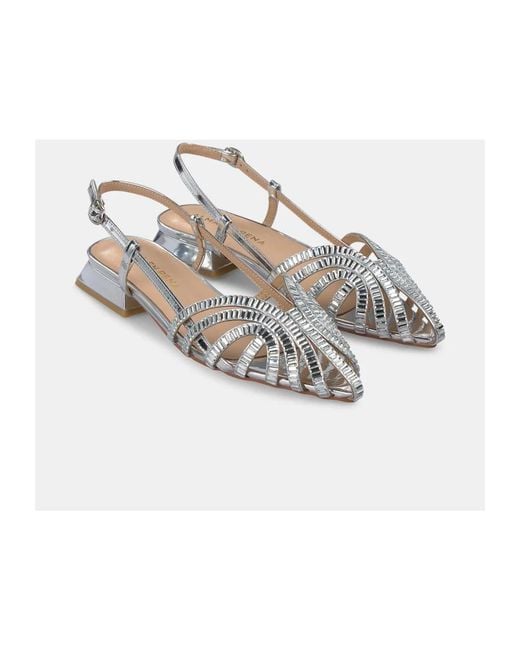 Alma En Pena. Metallic Flat Sandals