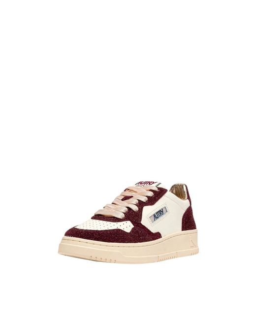 Sneakers di Autry in Pink